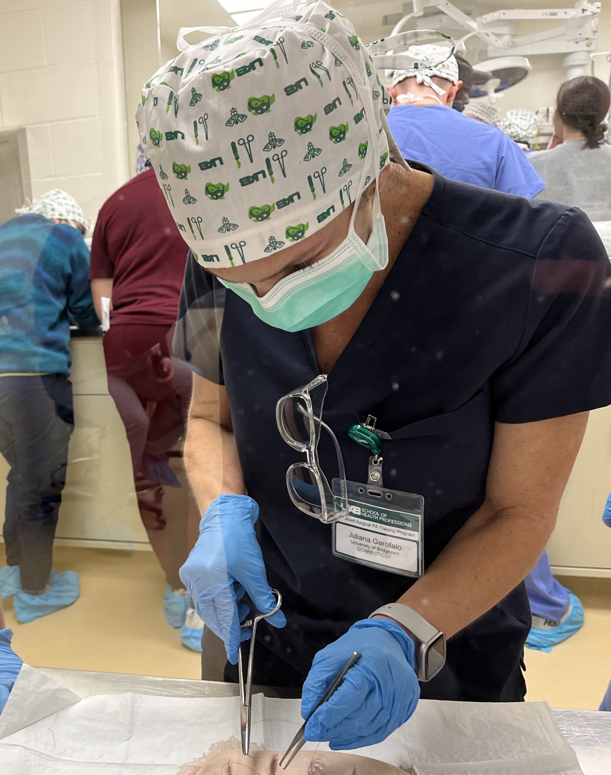 Juliana practicing her skills during the Advanced Surgical PA training program at the University of Alabama in Birmingham.