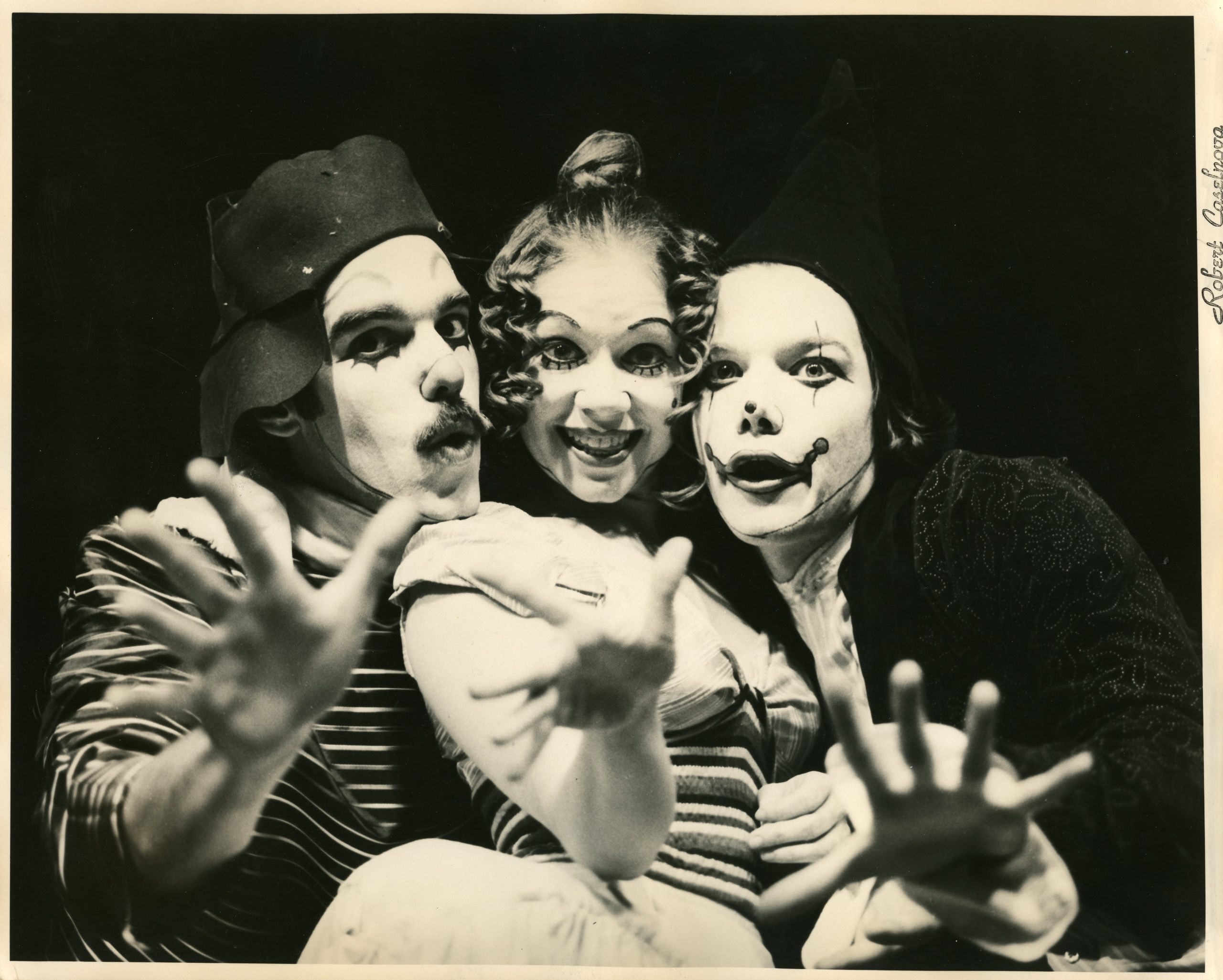 UB theatre students pose in vibrant carnival-inspired costumes, 1976.